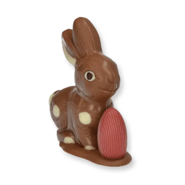 Small sitting bunny with egg, milk chocolate Easter bunny